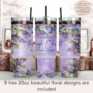 May include: A stainless steel tumbler with a white handle and a purple floral design. The tumbler has a gold rim and a straw. The text "I can do all things through Christ who strengthens me" is printed on the tumbler. Philippians 4:13 is also printed on the tumbler.