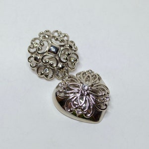 Vintage Trifari Casuals Silver Tone Rhinestone Cross Heart Filigree Medallion Brooch Pin Signed