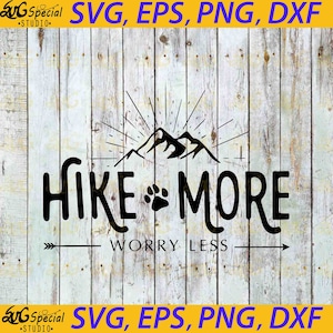 May include: Black and white graphic design with a mountain range and a paw print. The text reads "HIKE MORE WORRY LESS" with an arrow pointing to the right.