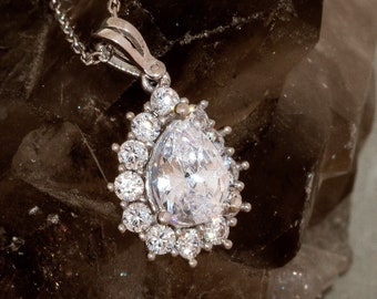 Gold or Silver 1.25 Carat Pear Cut Solitaire Necklace with Halo Design - Choose Moissanite or Cubic Zirconia
