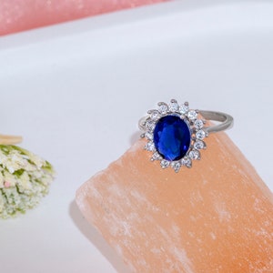 2.5 ct  Blue Sapphire in Flower Diamond Halo , Princess Diana Ring Style