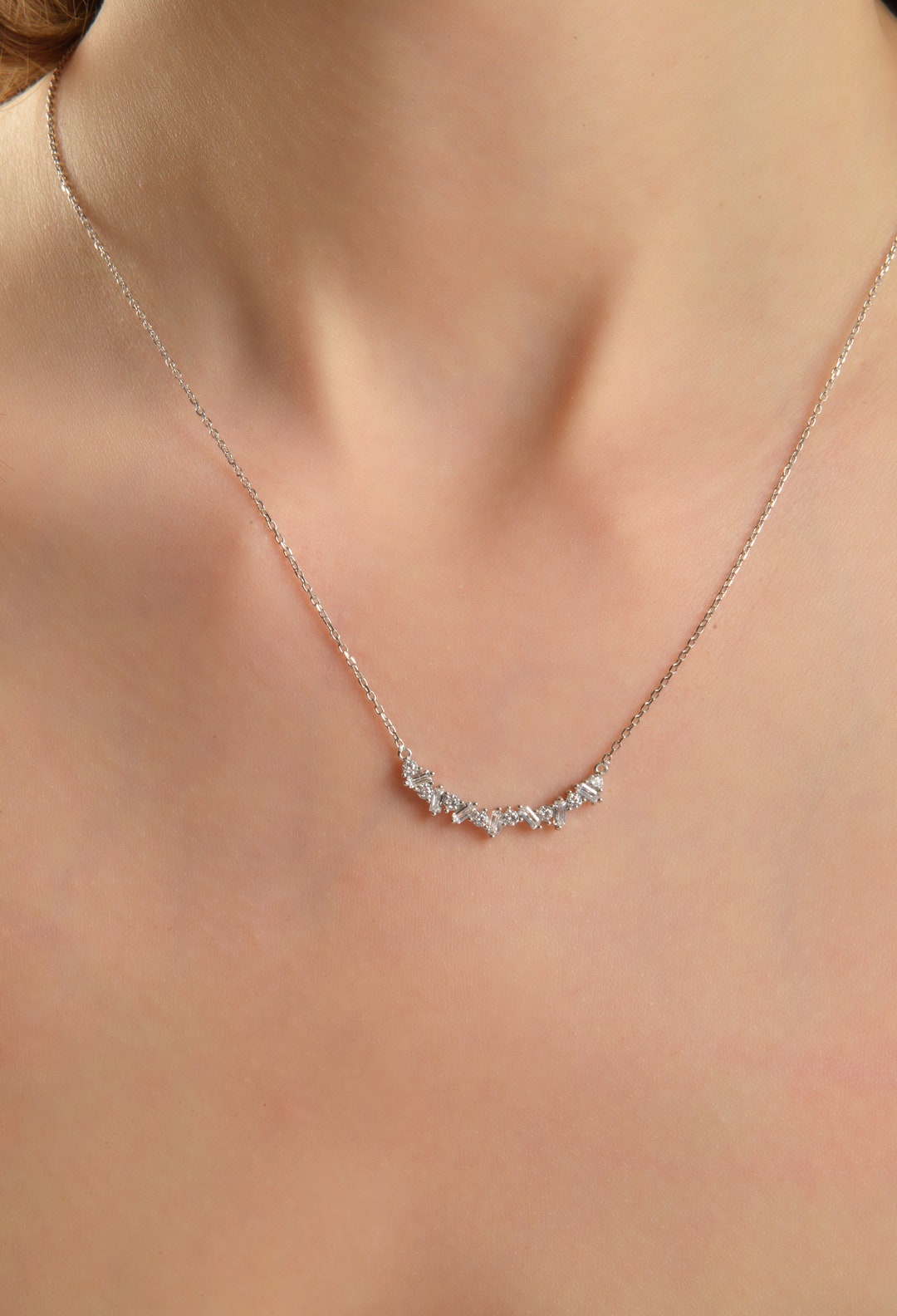 Collana in oro giallo con ciondolo trilogy