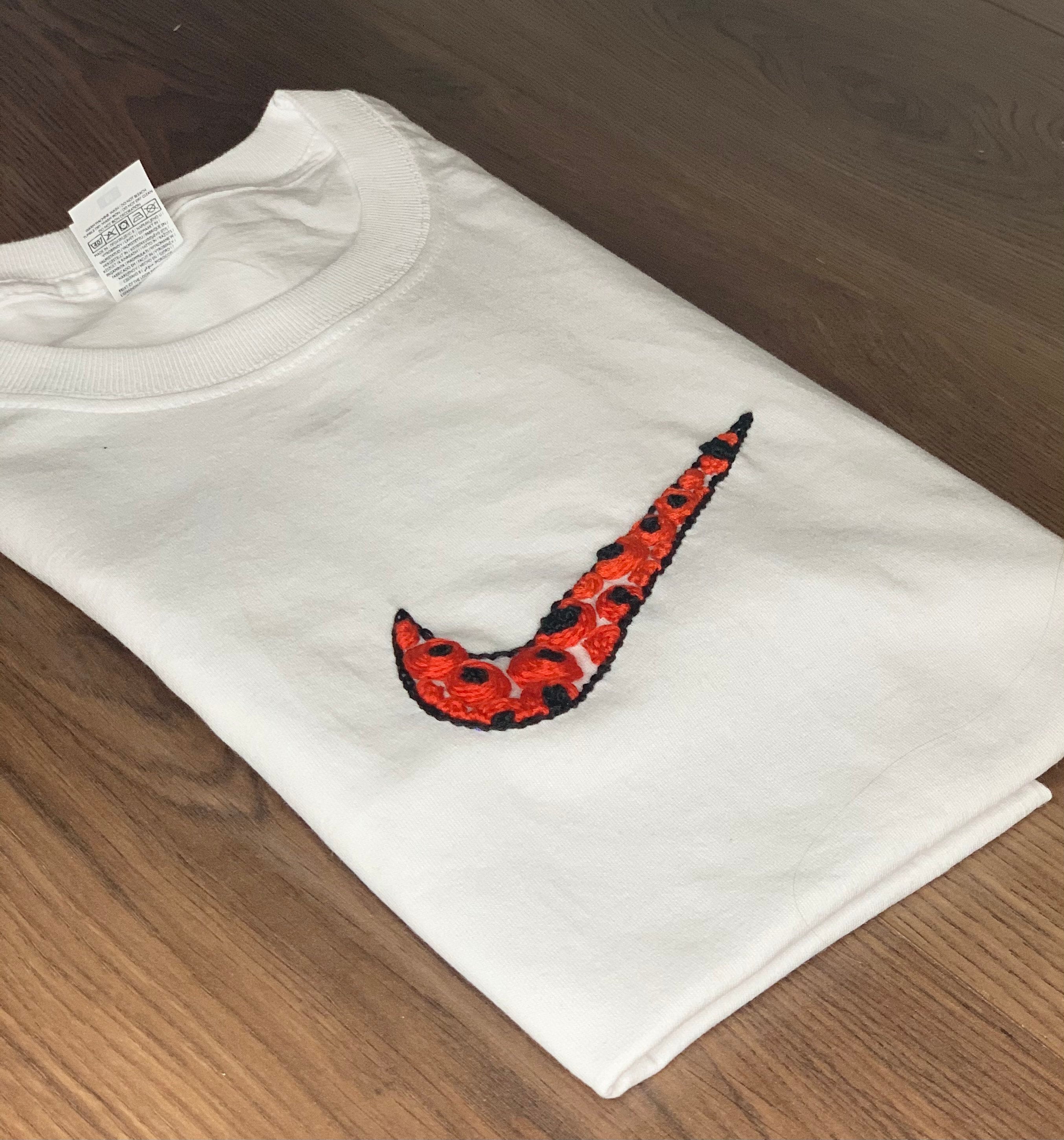 nike home tick t shirt