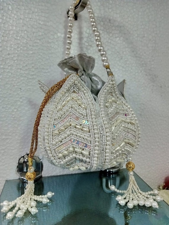 Handmade Multi Purpose Triangle Potli Bag – Craft Bazaar