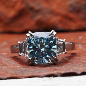 4.0 Ct Cushion Cut Lab Grown Blue Diamond Three Stone Engagement Ring