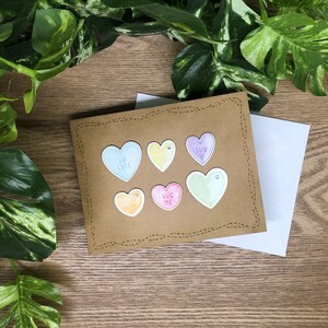 Carte faite main coeur de bonbons