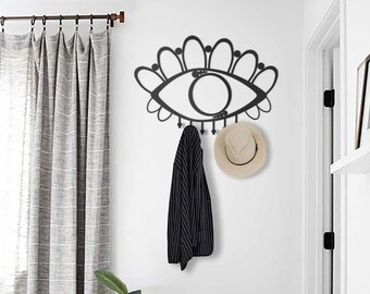 Modern Metal Wall Coat Rack: Decorative Eye Design, Black