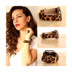 May include: A brown and gold leopard print Apple Watch band with the text "We Love You Mom" engraved on the band.