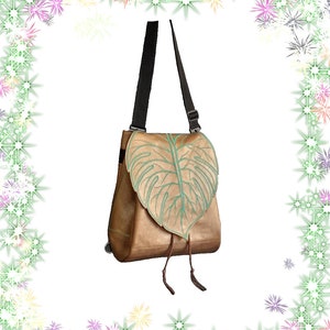 Embroidered monstera leaf backpack convertible into a shoulder bag