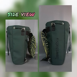 May include: A dark green bucket bag featuring a drawstring closure with metal grommets, a side zipper pocket, and a decorative wing-shaped attachment with yellow embroidery. The text "ConvertibleStyle" is embroidered vertically on the side.