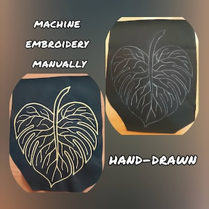 May include: Two black fabric squares featuring a monstera leaf design. The left square displays a gold machine-embroidered leaf, while the right square shows a white hand-drawn leaf outline. Text reads MACHINE EMBROIDERY MANUALLY and HAND-DRAWN.
