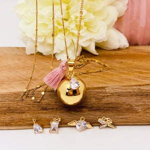 Maternity bola with pastille chain and 18k gold-plated zirconia charm