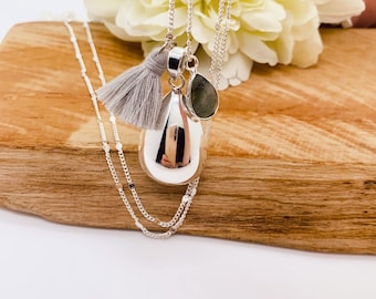 Silver plated water drop pregnancy bola with natural stone charm