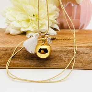 Maternity bola with gold lurex cord