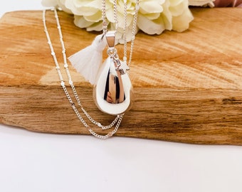 Silver-plated water drop pregnancy bola with small star charm