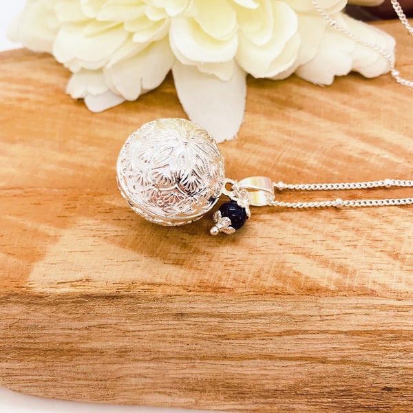 Flower pregnancy bola with semi-precious stone pendant
