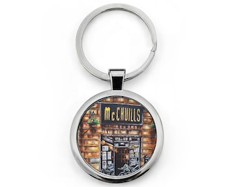 Llavero redondo de acero inoxidable con ilustración de McChuill's Pub Glasgow