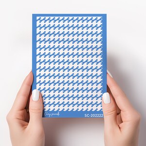 May include: A blue card with a white wave pattern and the text "Clay parah" and "SC-202222".