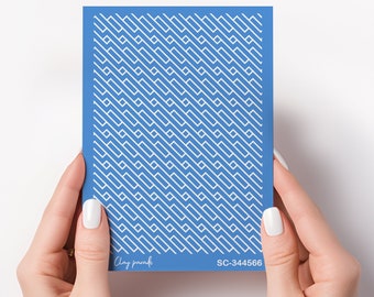 May include: A blue card with a white geometric pattern. The card has the text "Clay parade" and "SC-344566" printed on it.