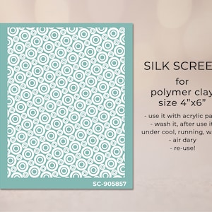 May include: A teal blue silkscreen with a repeating pattern of white circles. The silkscreen is for polymer clay and measures 4 inches by 6 inches. The text "SILK SCREEN for polymer clay size 4"x6"" is printed on the right side of the silkscreen. The text "SC-905857" is printed in the bottom right corner.