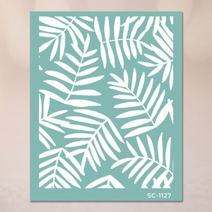 May include: A teal blue background with a white silhouette of a tropical leaf pattern. The pattern is repeated throughout the image. The text "SC-1127" is in the bottom right corner of the image.