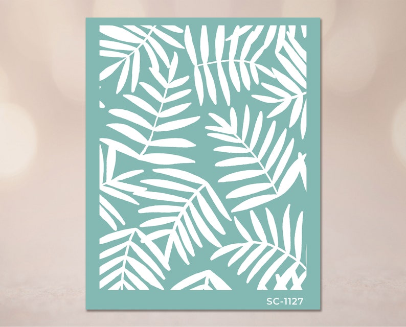 May include: A teal blue background with a white silhouette of a tropical leaf pattern. The pattern is repeated throughout the image. The text "SC-1127" is in the bottom right corner of the image.