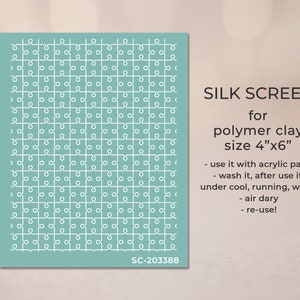 May include: A light blue silkscreen with a white jigsaw pattern. The silkscreen is for polymer clay and measures 4 inches by 6 inches. The text "SILK SCREEN" and "SC-203388" are printed on the silkscreen.