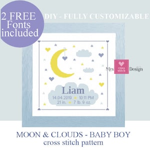 May include: A cross stitch pattern featuring a yellow crescent moon with a hanging heart, two blue clouds, and yellow stars on a white background. The name "Liam" is stitched below the moon and clouds, along with the date "14.04.2019", time "10:11 PM", length "21 in.", weight "7 lb. 9 oz.". The pattern is framed in a light blue frame.