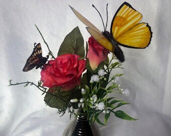 Pink flower bouquet vase with yellow butterflies