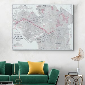 May include: A vintage map of the Borough of Queens, City of New York, with a red line tracing a route across the map. The map is printed on a white background with black and gray lines.