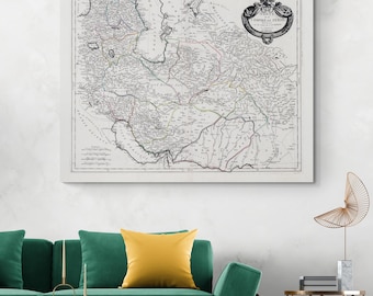 May include: A framed antique map print, featuring intricate details and a vintage aesthetic. The map, predominantly in grayscale, showcases geographical features with delicate lines and text. The title "EMPIRE DE PERSE" is displayed in an ornate cartouche. The print is mounted on a white background.