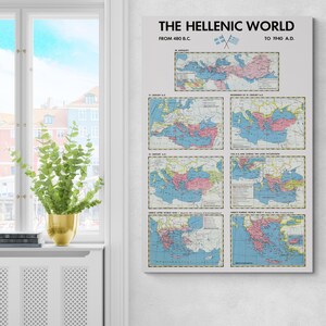 May include: A framed print titled "The Hellenic World" from 480 B.C. to 1940 A.D. The print features historical maps with pink, blue, and yellow regions, showcasing the evolution of the Hellenic world over time. Two Greek flags are at the top.