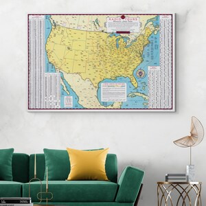 May include: A framed vintage map of the United States, featuring a yellow and blue color scheme. The map includes the text "RADIO TOURS America's Hotel Guide" at the top. The map is framed in a white border.