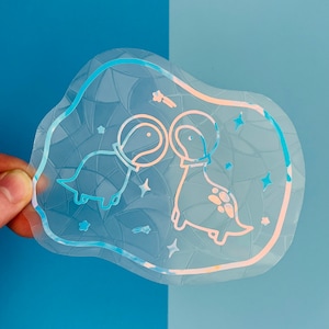 Space Dinos Suncatcher Sticker: Dinosaur Rainbow Maker Window Decal