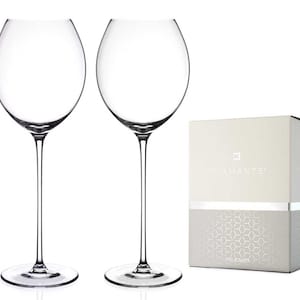 Two Elegance white wine glasses