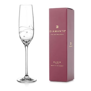 May include: A clear glass champagne flute with a delicate swirl design and small crystal accents. The flute is packaged in a burgundy box with gold lettering that reads "Diamante Elixir Fine Lead Free Crystal".