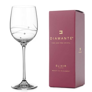 May include: A clear wine glass with a delicate swirl design and small crystal accents. The glass is part of the Diamante Elixir Collection, which is made of fine lead-free crystal.