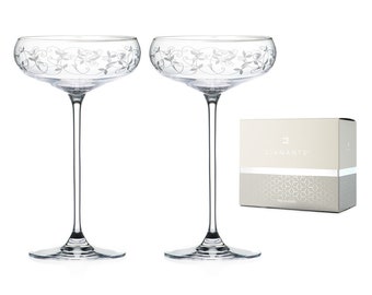 Two Arabesque champagne saucers