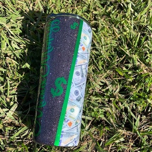 May include: A black and green tumbler with a dollar bill pattern and the text "Money Talks" on the side.