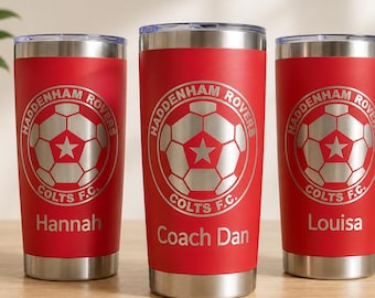 May include: Three red stainless steel tumblers with clear lids, each featuring a silver engraved soccer ball logo with the text HADDENHAM ROVERS COLTS F.C. and a central star. The tumblers are personalized with the names Hannah, Coach Dan, and Louisa.