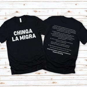May include: Black t-shirts with white text. One shirt reads "CHINGA LA MIGRA". The other shirt has text about constitutional rights, including "I do not wish to speak to you or answer your questions." and "KNOW YOUR RIGHTS www.irlc.org".