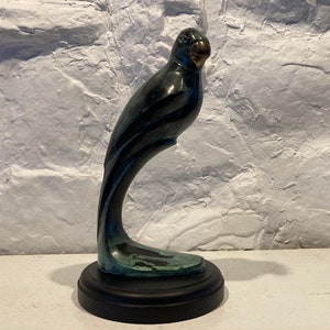 Solid brass parrot sculpture, patinated and mounted on wood base
