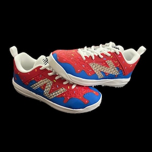 red and blue softball cleats