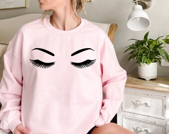 sweater with eyelashes