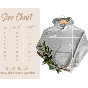 May include: Size chart for a Gildan 18500 Heavy Blend Hooded Sweatshirt. The chart shows the width and length in inches for sizes S through 5X.
