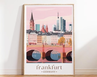 May include: A vertical art print featuring a stylized illustration of the Frankfurt, Germany skyline. The scene depicts a pink-toned cityscape with a bridge over water in the foreground, a church spire, and modern skyscrapers. The text reads frankfurt • GERMANY •.