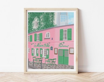 May include: A framed print of La Maison Rose restaurant in Paris. The pink building has green shutters and doors, with green tables and chairs outside. The text "La Maison Rose Restaurant" is visible.
