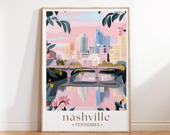 May include: A framed art print featuring a stylized illustration of the Nashville, Tennessee skyline. The artwork showcases a bridge over a river, with buildings in shades of pink, blue, and yellow. The word "nashville" is printed at the bottom.