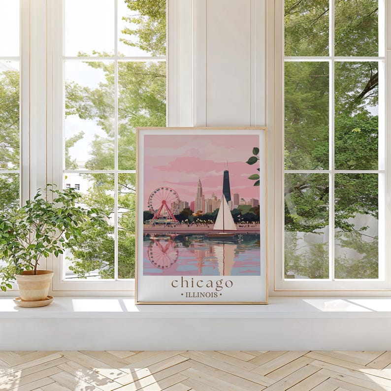 a window sill with a picture of a city and a ferris wheel