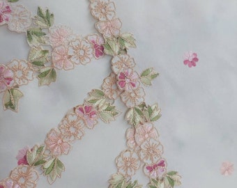 A set of 6 very pretty diversible  table  linens. Smothered in pretty pink embroidered flowers. Pretty table linen , indoor or outdoor use.